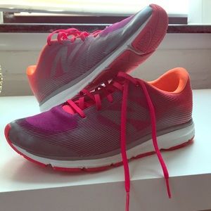 Neon New Balance cross-trainer shoes